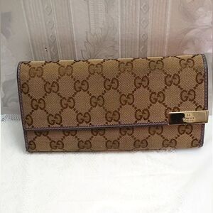 Gucci Bifold Signature Canvas Long Wallet